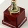 Cup 042C, award figure, gold, plastic stand, 26.2 × 8.7 × 7.5 cm.