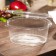 A plastic disposable container with an insoluble lid, 1 l, 17.5 × 14.9 × 7.9 cm, the color is transparent