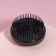 The comb is massage, round, folding, with a mirror, D = 7.5 cm, black color