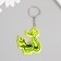 A keychain plastic reflective "Eikh on a branch" 5.5x4.8 cm