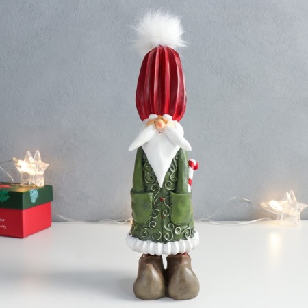 Souvenir Polystone "Santa - Fakir in green fur coat" 7x8x24 cm