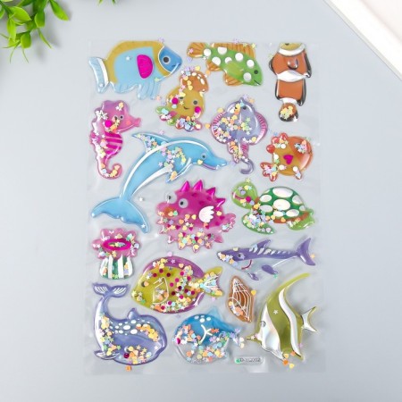 The plastic sticker is voluminous with glitter "dinosaurs/fish" gold/silver mix-2