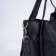 Bag Women's Tout on the button, a cosmetic bag with a zipper, black color
