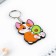 A wooden key key "Corgi with avocado", 4.4 x 6.4 cm
