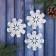 Christmas tree decoration "Snowflake from the feather" (set of 3 pcs) 7 cm, white
