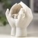 Souvenir Polystone "Angel Sleeping in the palms" 6.7x5.5x4.3 cm