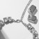 Set 4 objects: earrings, necklaces, bracelet, “evening” ring volume, white in silver