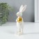 Souvenir Polystone "Easter rabbit with a gold egg" 4x4x13 cm