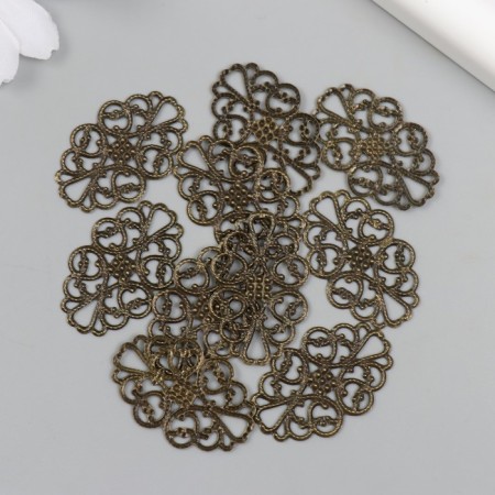 Decorative eelement of bronze 2x3.2 cm-2