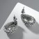 Earrings with rhinestones "Sea radiance", emerald color in black silver