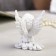 Suvenir Polystone "A Snowthrough Angel with a ball of rhinestones sits" mix 8x6x2.5 cm