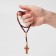 Parsing wooden "Orthodox" 50 beads through a ball, with a cross, a dark brown color