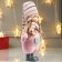 Interior doll "Girl in pink overalls and in pink cap" 49x8x14 cm