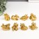 Souvenir Polystone "Golden Elephant with Flower" set 8 pcs 5.5x4x4 cm