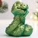 Figure "Snake Baby" light green, 5x4cm