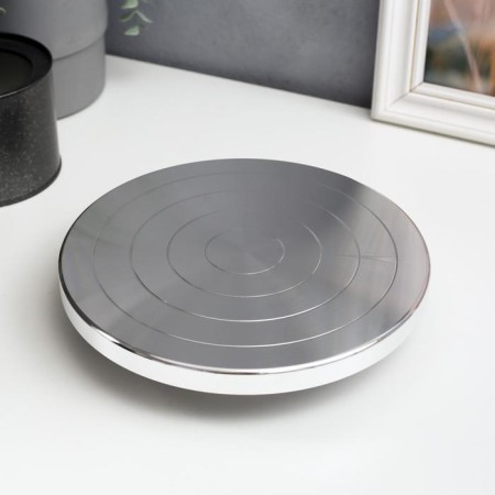 Honcharger of manual (sculptural) double -sided metal d = 20 cm