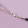 Piece on the “brightness” cord triangle, the color of turquoise blue in silver, l = 42cm