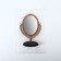 The mirror is desktop, bilateral, with an increase, mirror surface 8.5 × 12.1 cm, bronze color