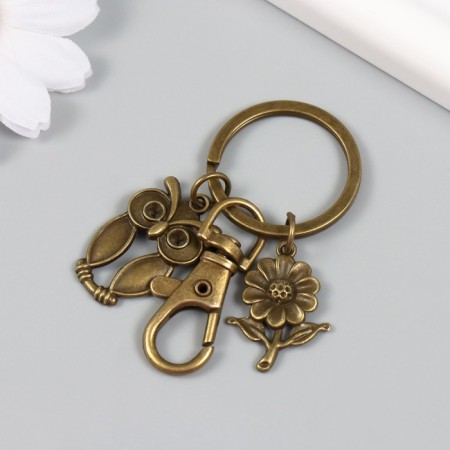 Trick Metal with carbine "Eagle and Flower" Bronze 6 cm-2