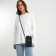 Female bag, cross-bodi, on the magnet, the color is black