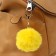 Fluffy on a ring with a carbine "Smile" yellow 8x8 cm