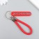 Keychain metal to the leatherette "strap with a license plate" red 12.5x4 cm