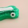 Bone-handler bean with a sticker for a note of 3 glow modes, green