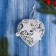 Christmas tree decoration "Lace heart with stars" 9x10 cm, white