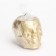 Candle "Skull" in a candlestick of gypsum with faces, 6x9x6.5cm, gold