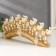 Polystone souvenir "Seven white elephants in golden blankets on a carved tusk" 11x3.5x28.5 cm