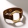 Bracelet Skin "Pompeii" rivets, brown color in gold, 21 cm