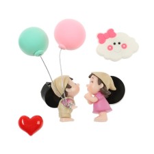 Toy in a car deflector, a couple in love, K2