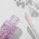 Set 2 objects: bracelet, lip gloss "unicorn" panda, black and white color, 6 cm