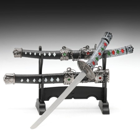 Suv. Product Katana-Mini 2B1 on a stand, black scabbard with white rhombuses 16/20cm mix