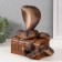 New Year's figure "Cobra on the chest" 20 x 17 x 12 cm, brown