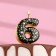 Candle in the Sanata cake, number "6", black with gold stars, 5.5 cm
