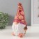 The piggy bank "Gnome Scandil" is height 22.5 cm, width 9.5 cm, length 11.5 cm.