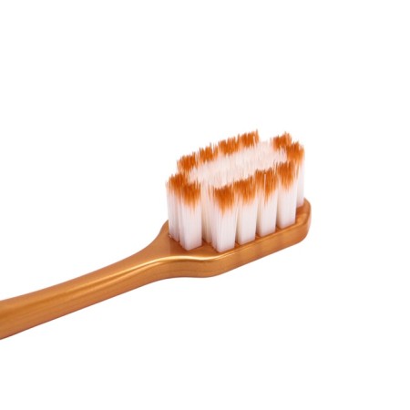 A toothbrush with a wide head of 10,000 bristles, soft-3