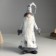 Interior doll "Santa Claus in gray caftan in a cage" with silver 16x13x60 cm