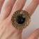 The ring of "ethnic" openwork circle, black color in black gold, dimensionless
