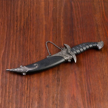 Curved souvenir knife, 26.5 cm, a long curl on the scabbard, black-1