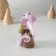Polystone souvenir "Lilac cobra with a bag of coins" 4x4x8 cm