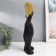 Souvenir Polystone stand "A man with a bird on the shoulder" black 14x33 cm