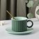 Tea couple ceramic "Profitrol", 3 objects: a cup 180 ml, a saucer d = 13.7 cm, spoon, green color