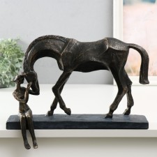 Polystone souvenir on the shelf 
