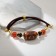 Buslet “Bead Ji” on the lace, barrel, brown-red color, D = 7 cm