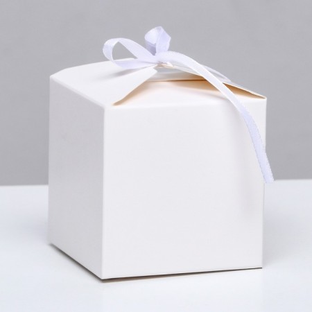 The box is folding, square, white, 8 x 8 x 8 cm,