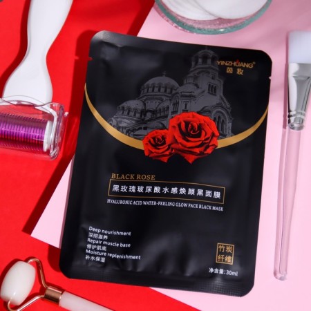 The mask is smoky, fabric, moisturizing, for the face, with a black rose extract