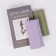 Women's wallet on the button, green color