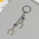 Keychain from the evil eye Metal "two horseshoes" 9 cm